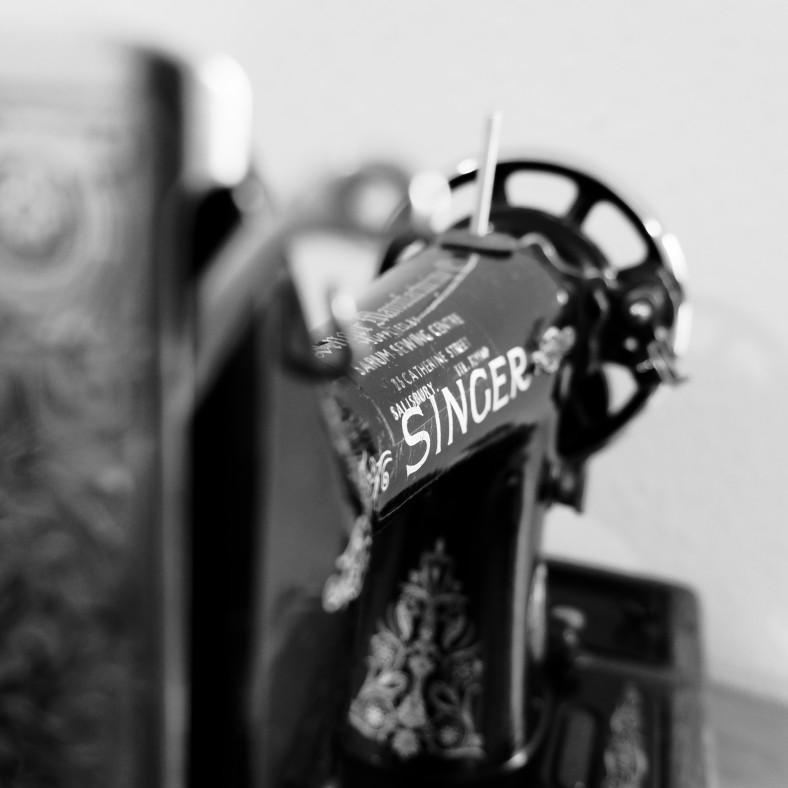 Black and white image of a Singer sewing machine